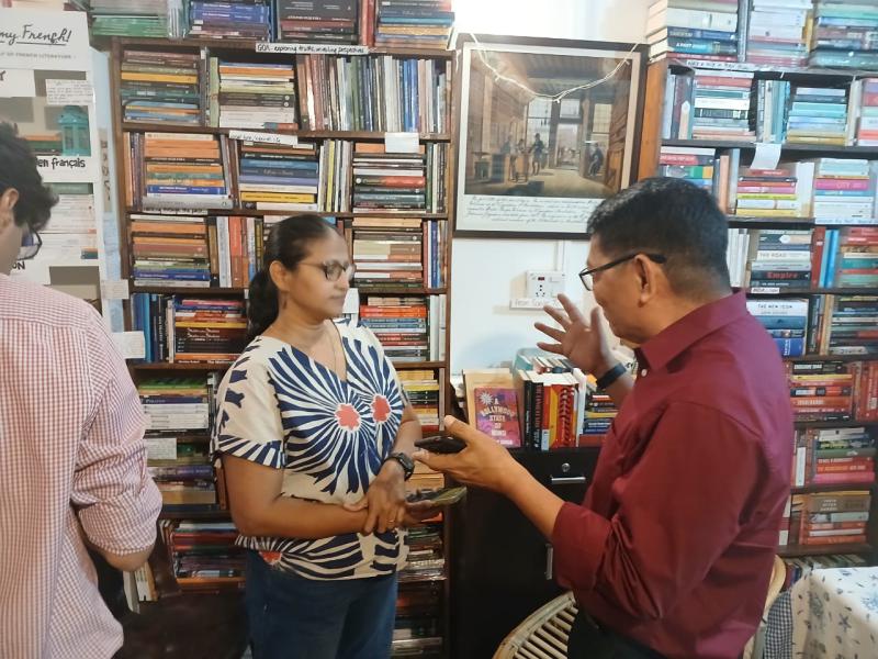 Explaining content of my book with a reader during "Meet the author" event organised by a popular book store in Goa.